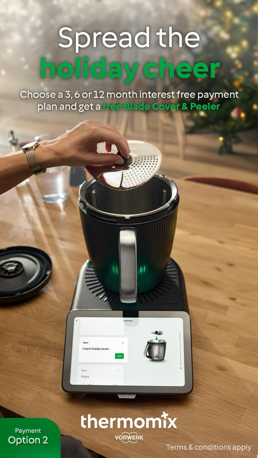 Thermomix® TM7 jug with Blade Cover & Peeler and tablet showing guided cooking steps